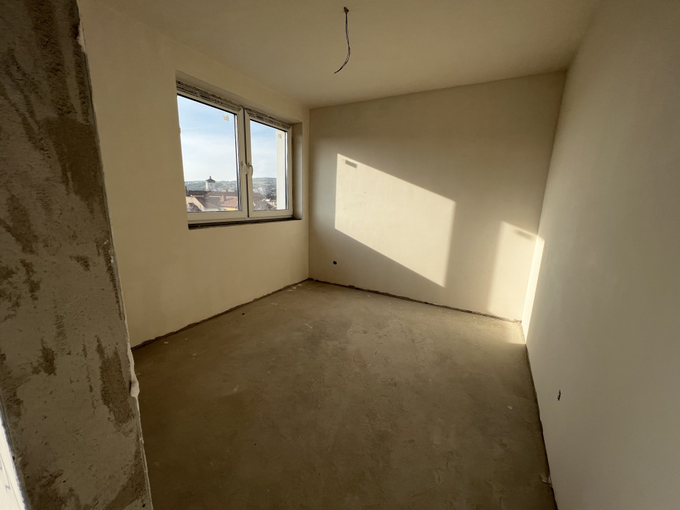 ZONA CENTRALĂ! Apartament 2 camere, parcare subterană inclusă, bloc nou