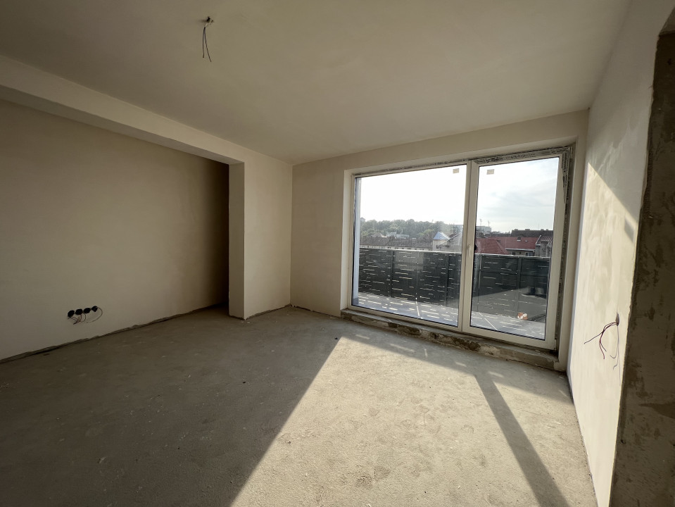 ZONA CENTRALĂ! Apartament 2 camere, parcare subterană inclusă, bloc nou