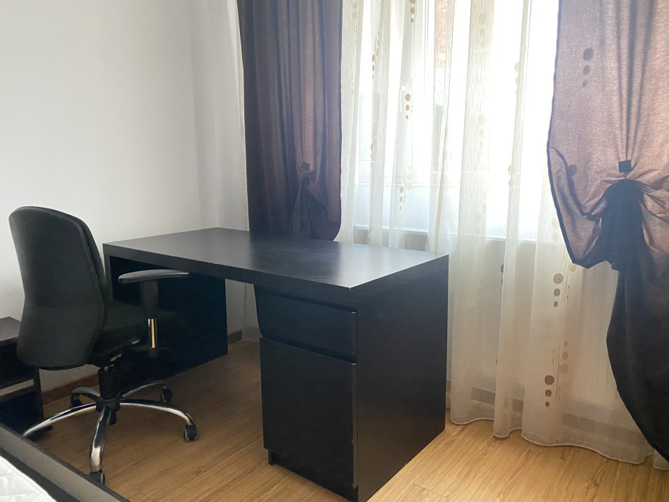 Inchiriere apartament cu gradina proaspat renovat si parcare