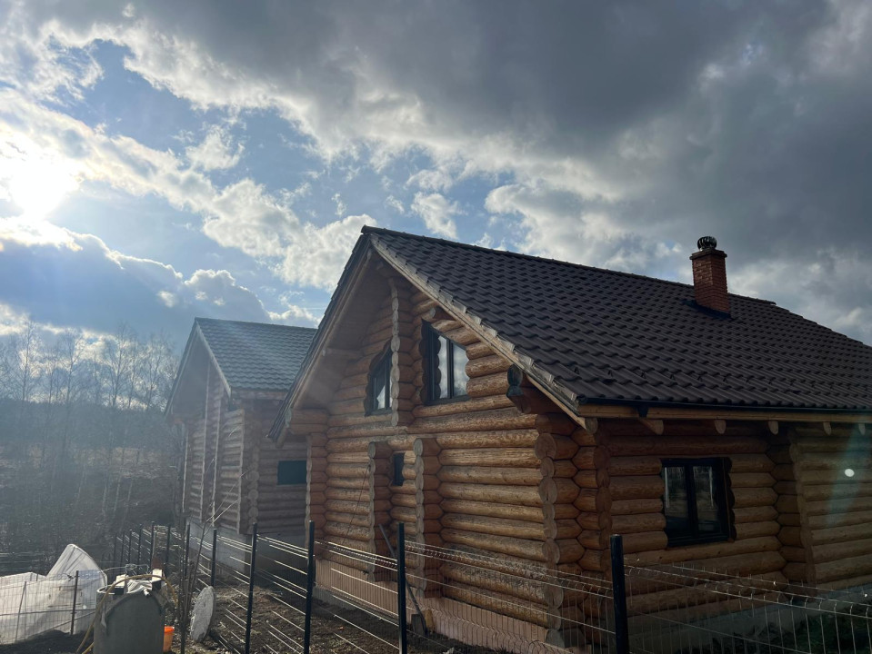 2 cabane de buștean, teren generos, moderne, Bălcești, Cluj