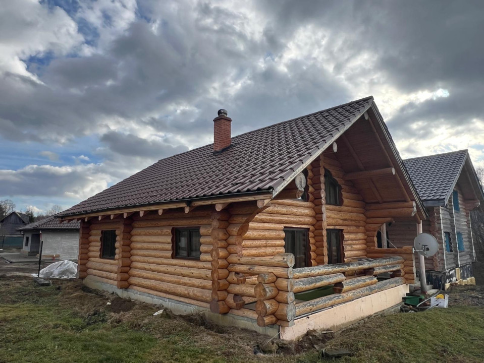 2 cabane de buștean, teren generos, moderne, Bălcești, Cluj