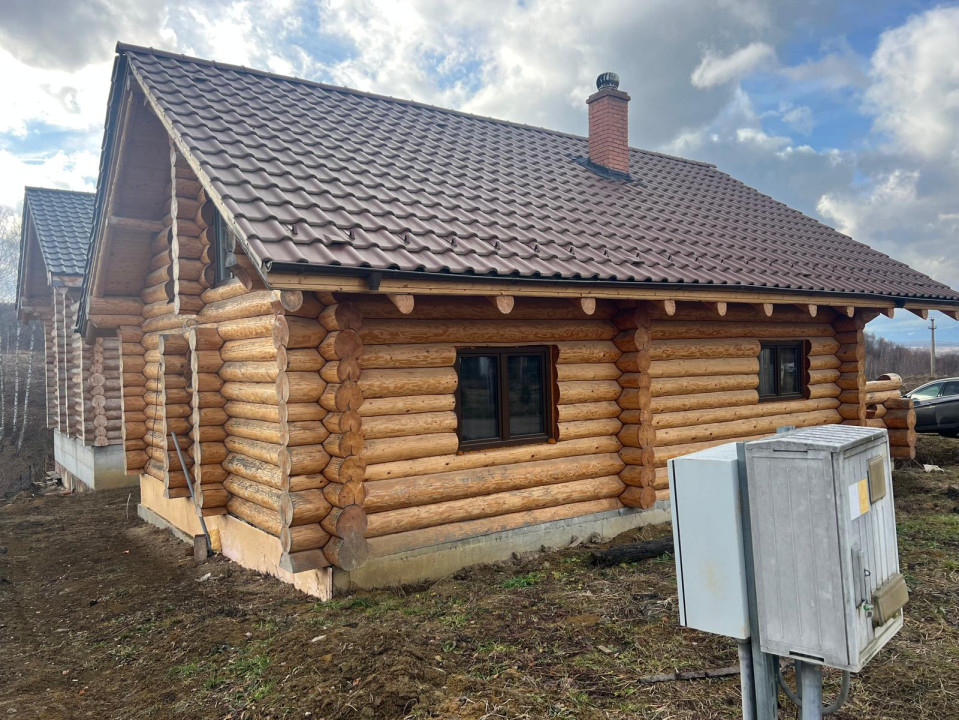 2 cabane de buștean, teren generos, moderne, Bălcești, Cluj
