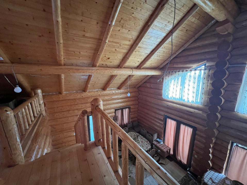 2 cabane de buștean, teren generos, moderne, Bălcești, Cluj