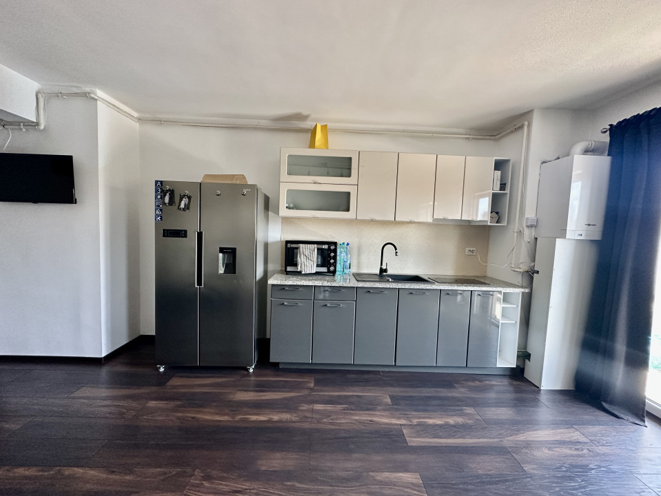 Apartament spațios, cu chiriași preluați, balcon și parcare – bloc din 2020