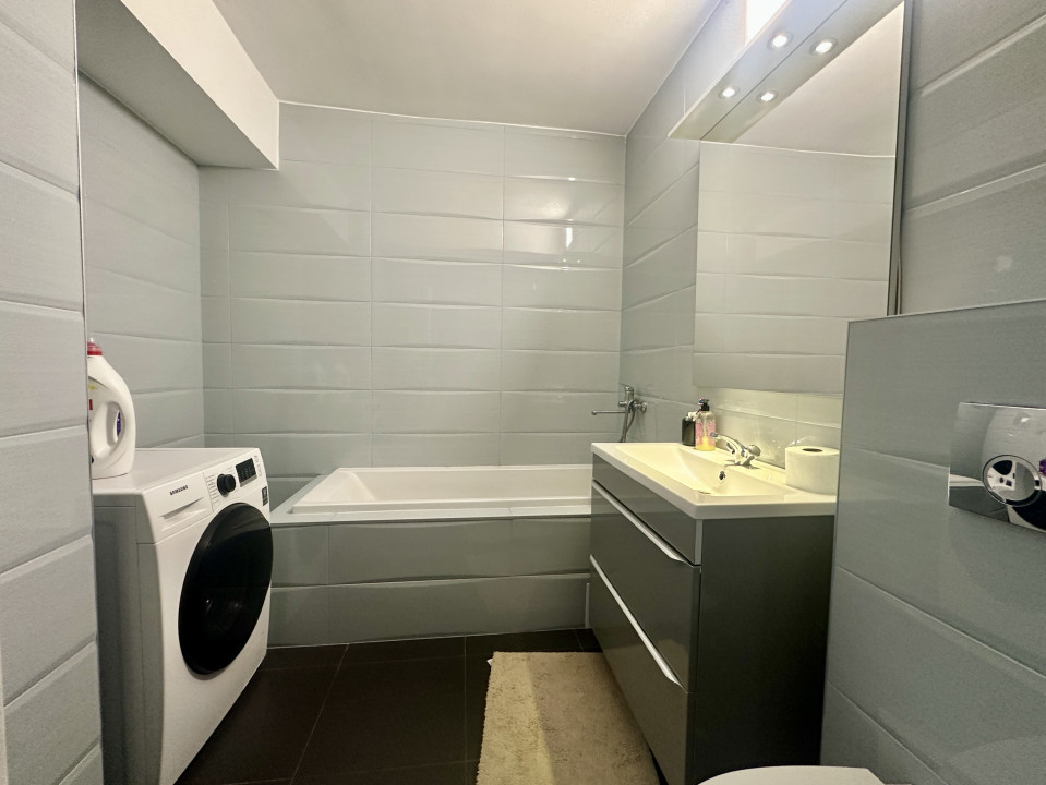 Apartament spațios, cu chiriași preluați, balcon și parcare – bloc din 2020