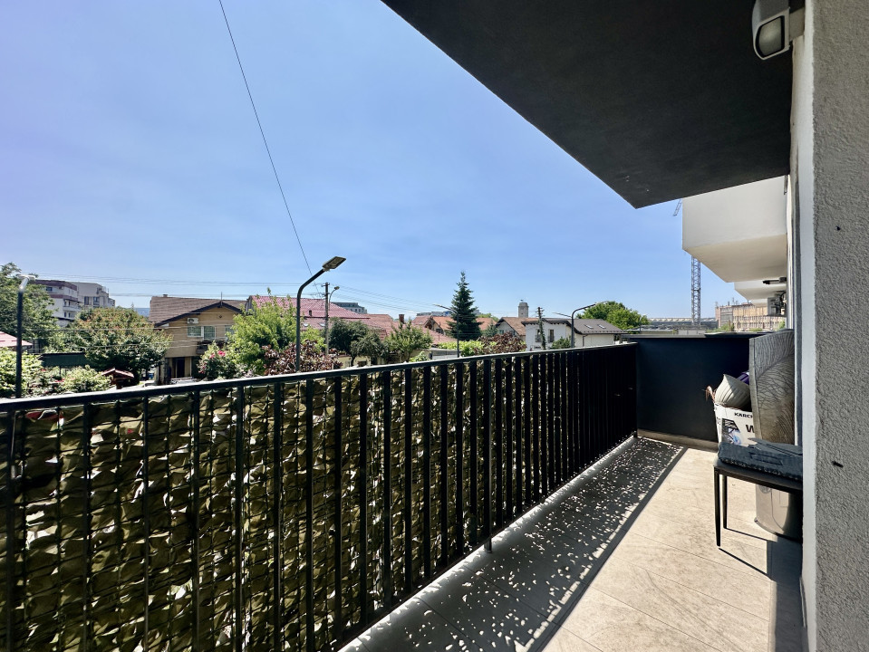 Apartament spațios, cu chiriași preluați, balcon și parcare – bloc din 2020