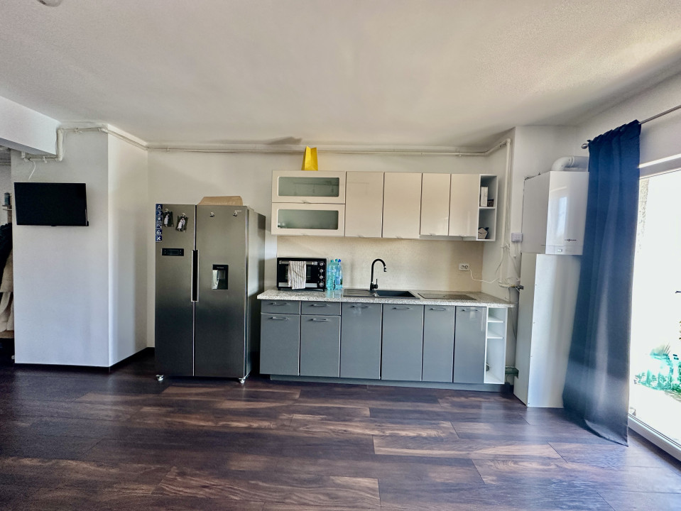 Apartament spațios, cu chiriași preluați, balcon și parcare – bloc din 2020