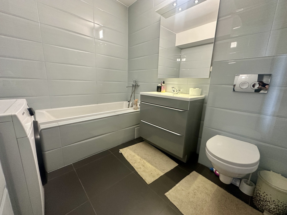 Apartament spațios, cu chiriași preluați, balcon și parcare – bloc din 2020
