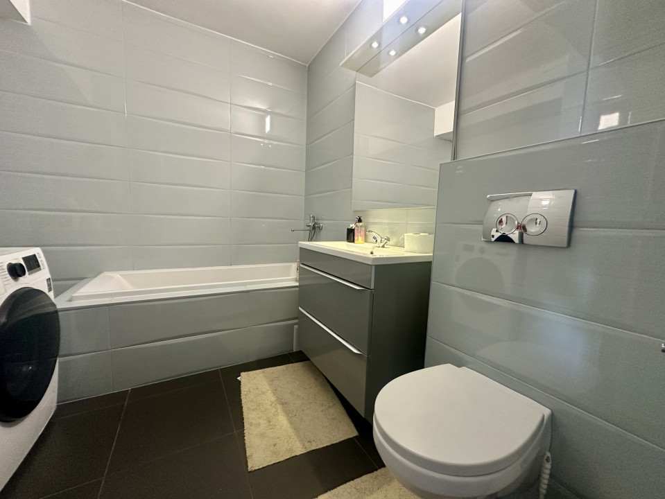 Apartament spațios, cu chiriași preluați, balcon și parcare – bloc din 2020
