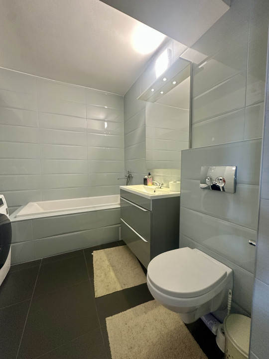 Apartament spațios, cu chiriași preluați, balcon și parcare – bloc din 2020