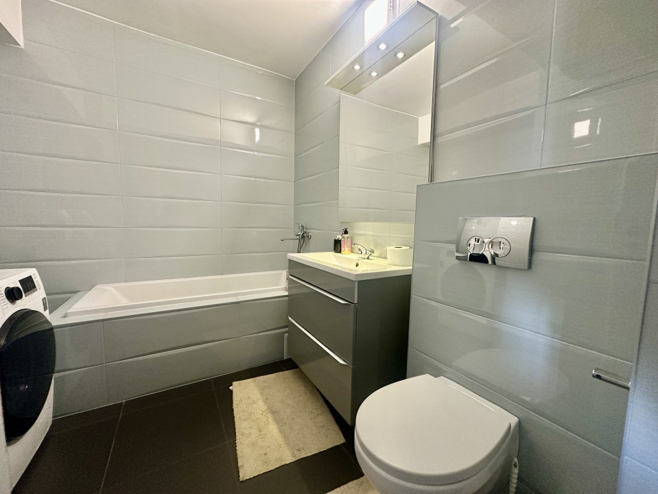 Apartament spațios, cu chiriași preluați, balcon și parcare – bloc din 2020