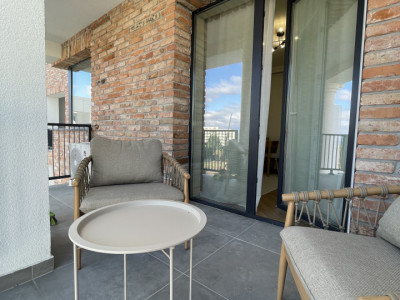 Prima închiriere! 2 camere ultrafinisat cu parcare în curte privată