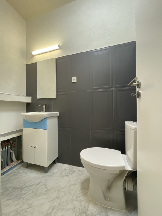 Apartament cu 3 camere, 2 băi și terasă de 35mp